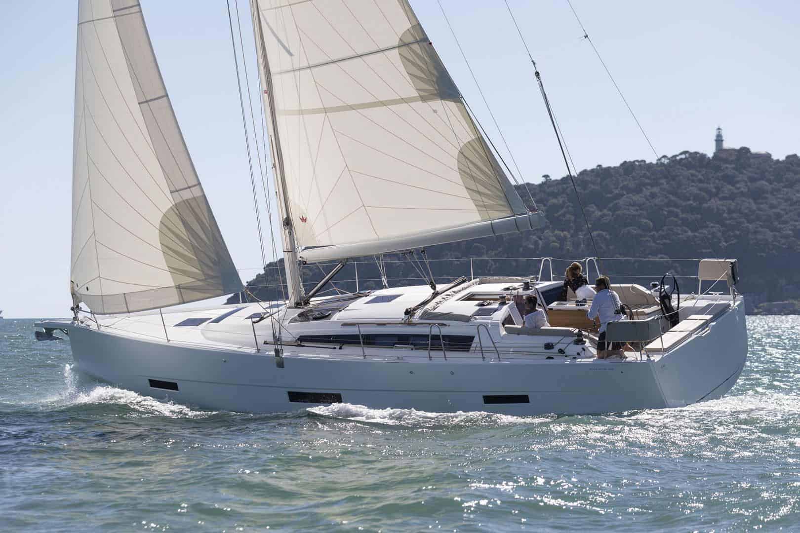 Dufour 430 Grand Large in action with wind in its sail, going fast ahead on a sunny day