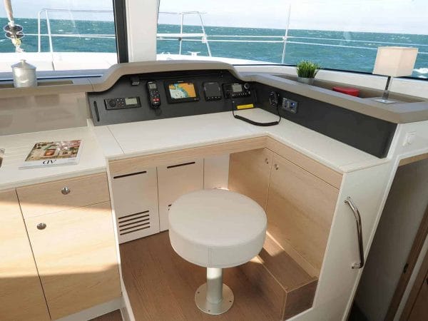 BALI 4.1 Catamaran control panel or table map and a chair in front of it