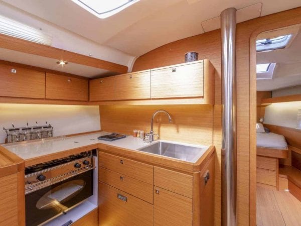 Dufour Grand Large 430's galley with beautifully designed sink, stove and countertop